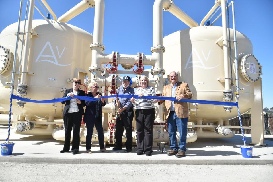 Image of the Zone 7 Board of Directors cutting the ribbon on the Ion Exchange (IX) PFAS Treatment Facility at Stoneridge Well on September 13, 2023 (L to R: Director Laurene Green, Director Sarah Palmer, President Sandy Figuers, Director Kathy Narum, and Vice-President Dennis Gambs)