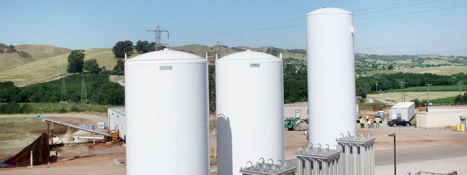  Three large white liquid oxygen tanks at Del Valle Water Treatment Plant